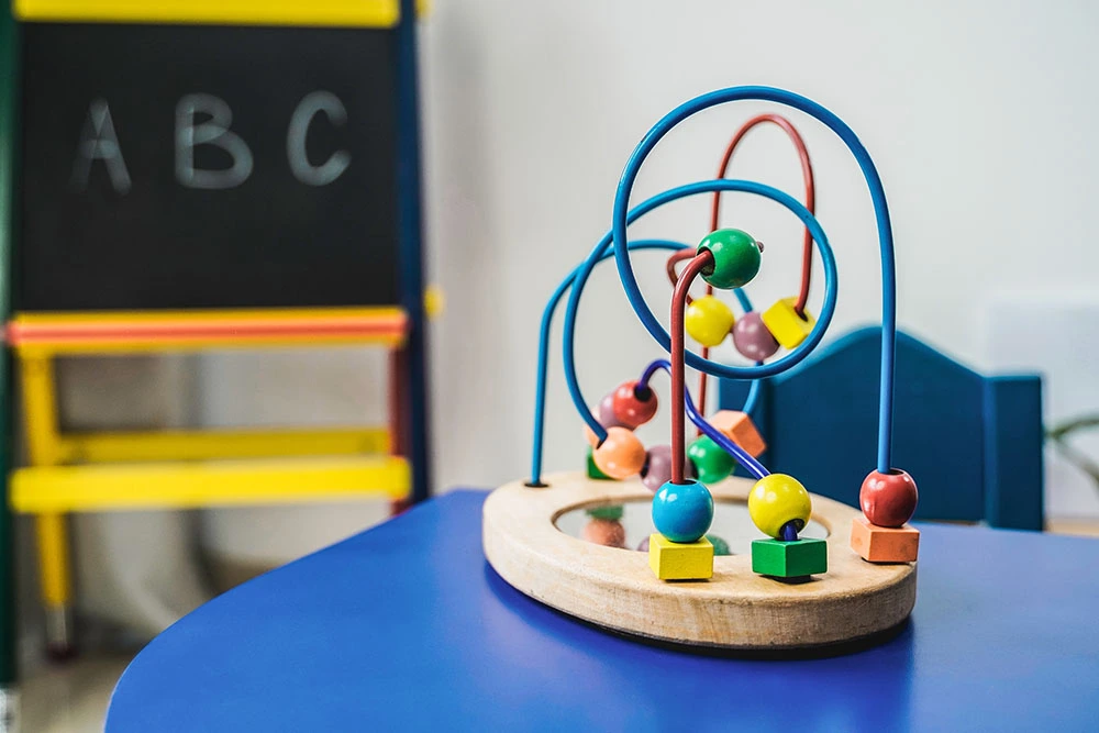 Learning beads activity on a classroom table